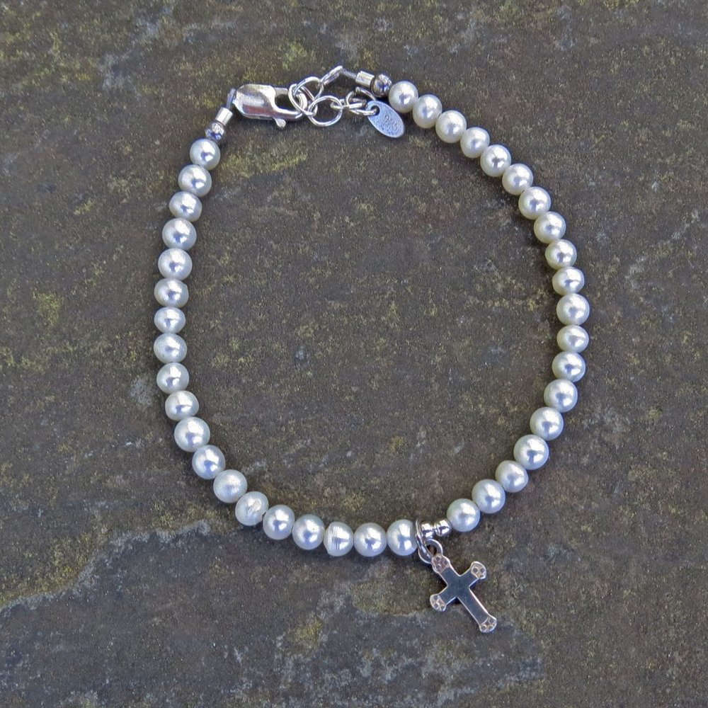 Girl's pearl and sterling silver cross bracelet